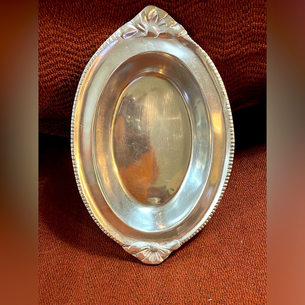 Source unknown on the brand,Size 121/4”sX 73/4”s,Not for sure but I think pewter